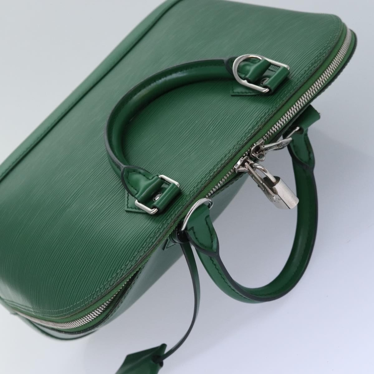 LOUIS VUITTON Alma Handbag