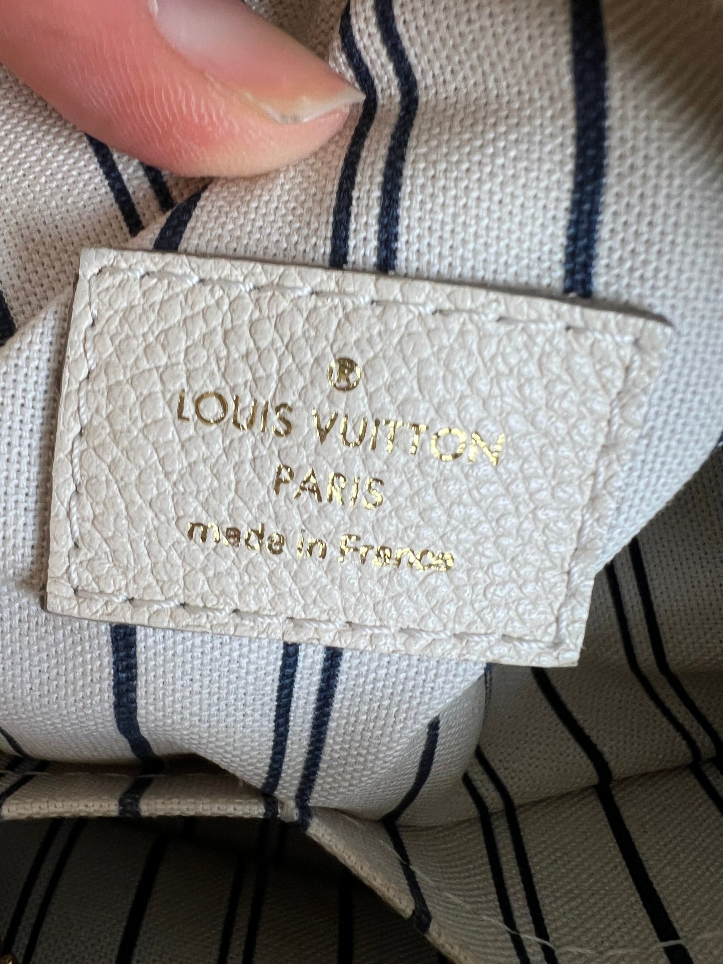 Louis Vuitton Inspiree in Cream Empreinte Leather with gold hardware