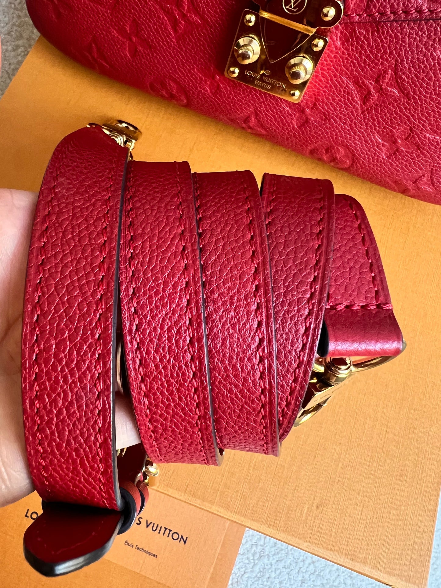 Louis Vuitton Pochette Metis Red Empreinte (RRP £2,130)