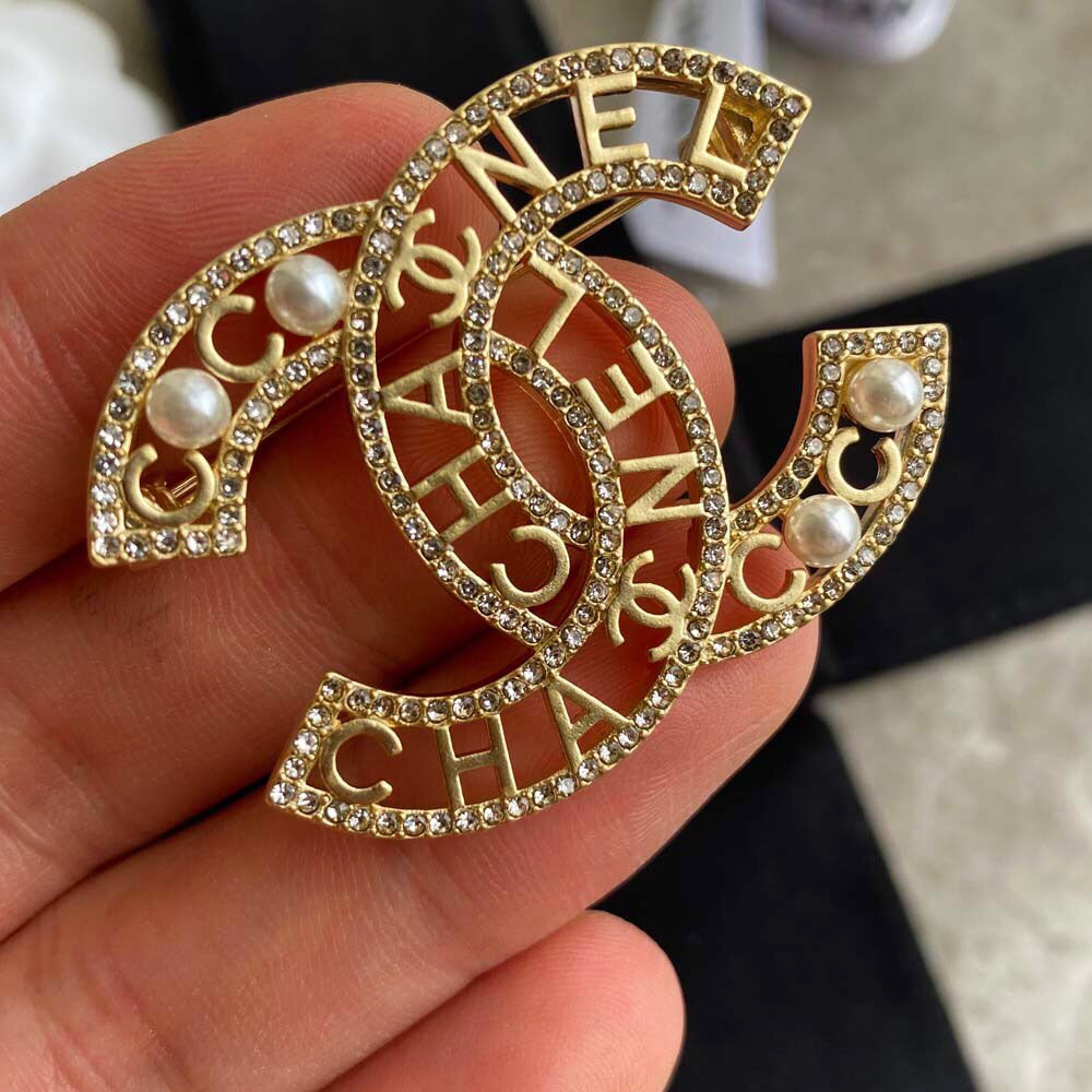 C h brooch