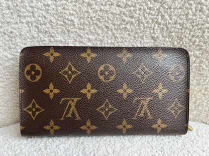 Louis Vuitton Porte Monnaie Zip Around Long Wallet in Monogram