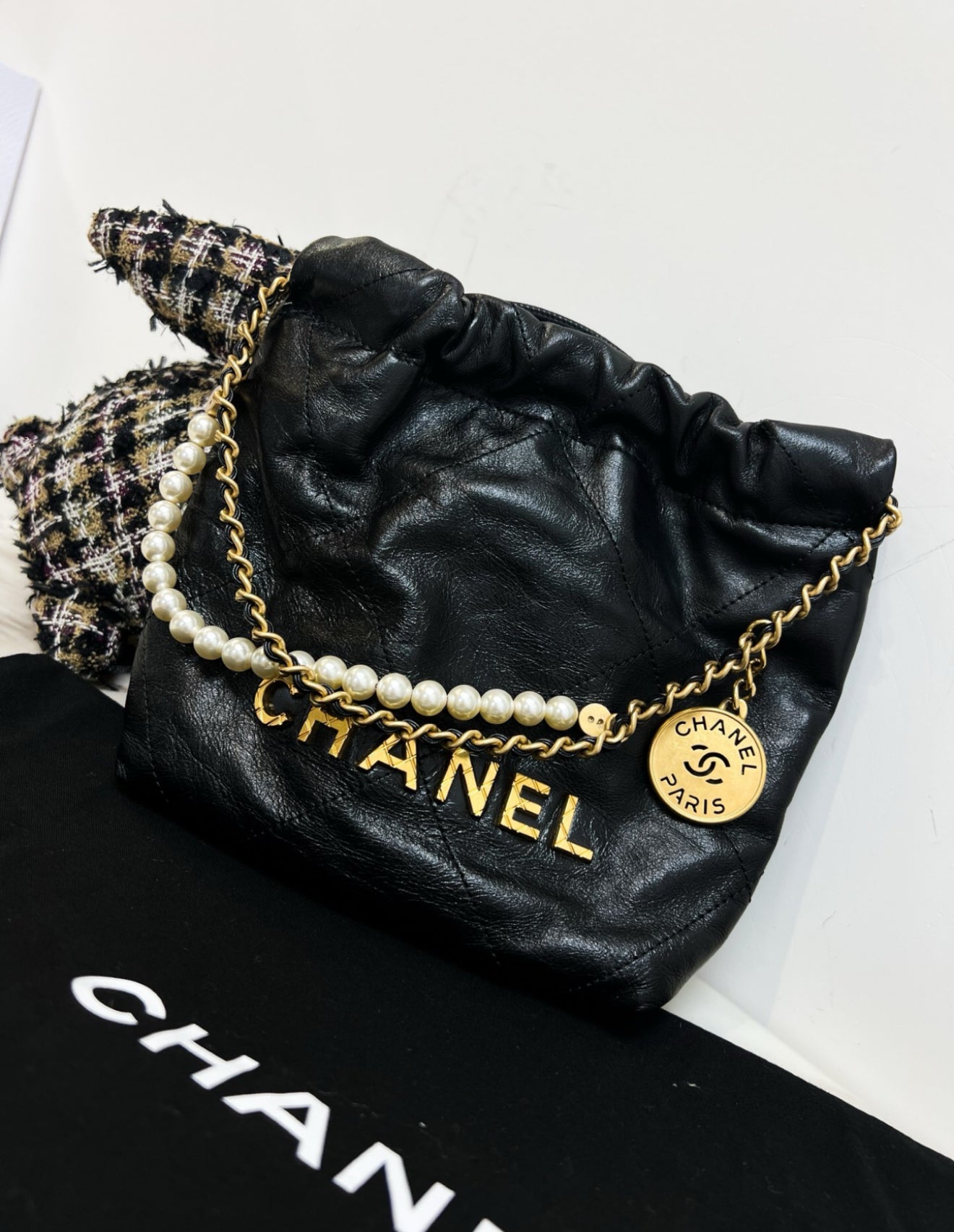 Chanel Black Quilted Calfskin Imitation Pearl Strap Mini 22 Hobo Bag Gold Hardware