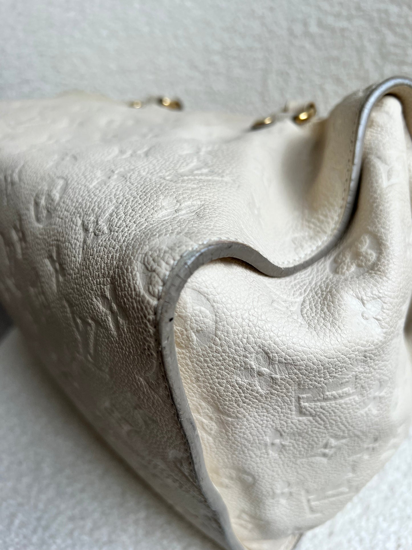 Louis Vuitton Inspiree in Cream Empreinte Leather with gold hardware