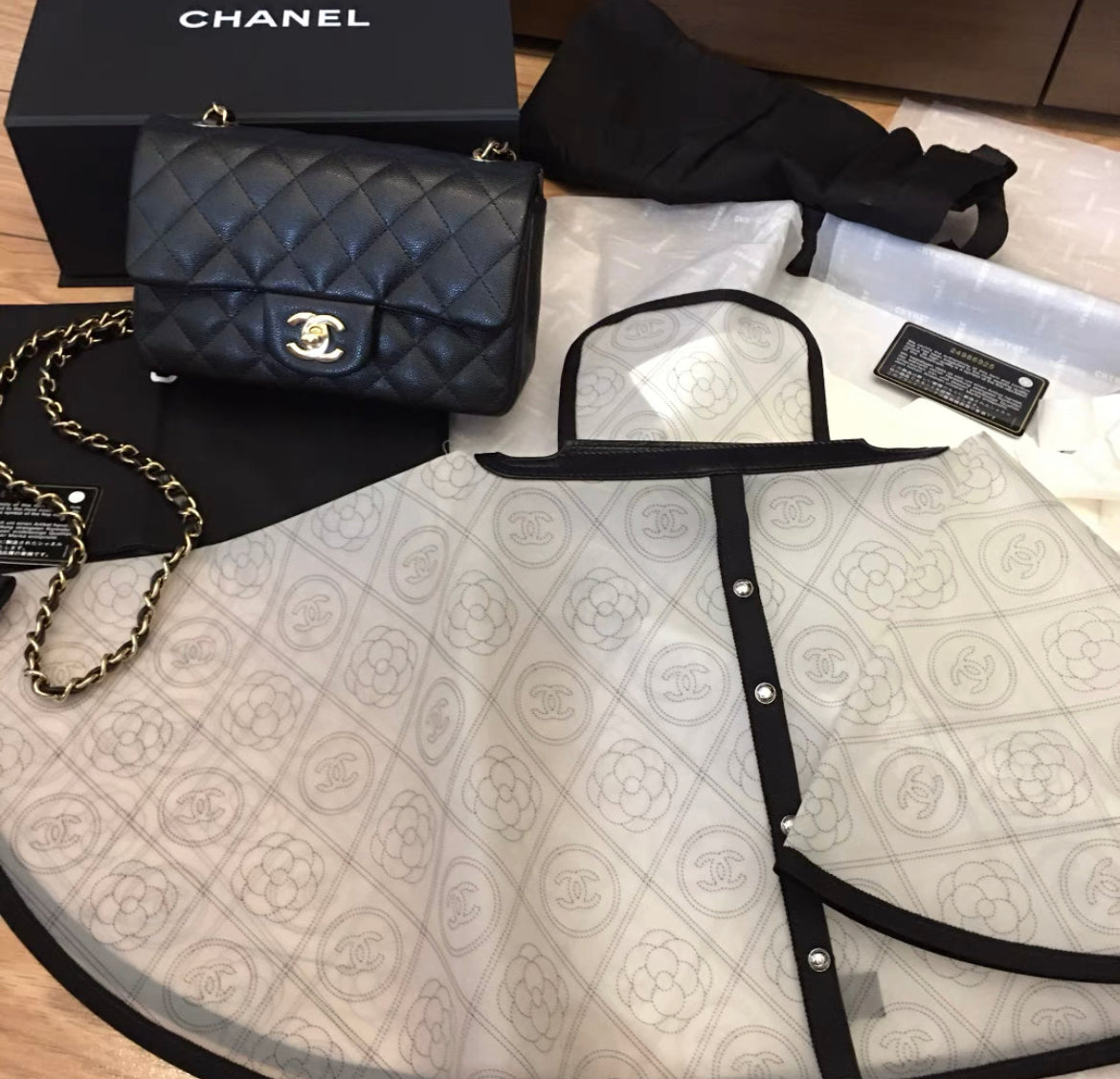 Chanel Camellia Handbag Raincoat Printed Pvc