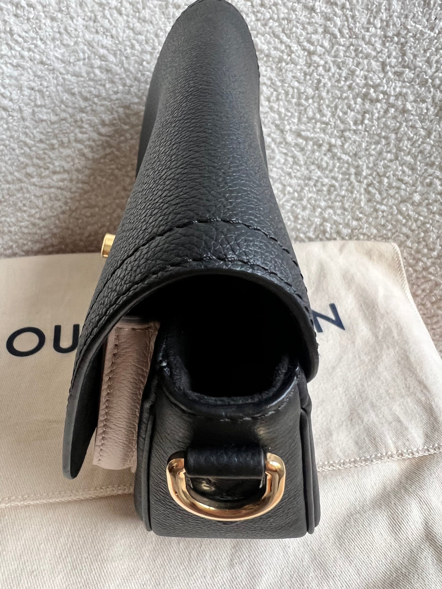 Louis Vuitton Lockme Tender (£2,270)