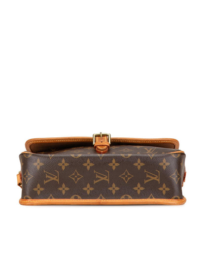 Monogram Canvas Crossbody Bag with Adjustable Strap and Buckle Closure