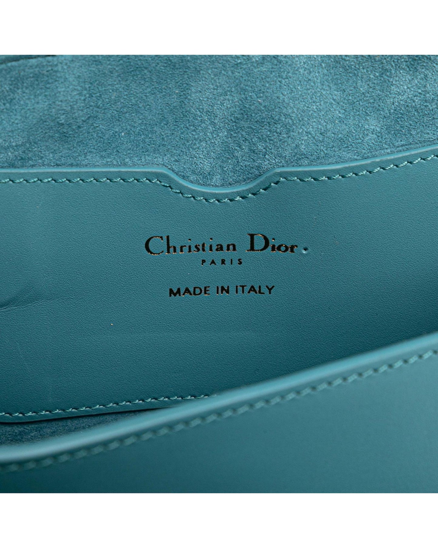 Calfskin East West Crossbody Bag with Adjustable Strap and Buckle Closure