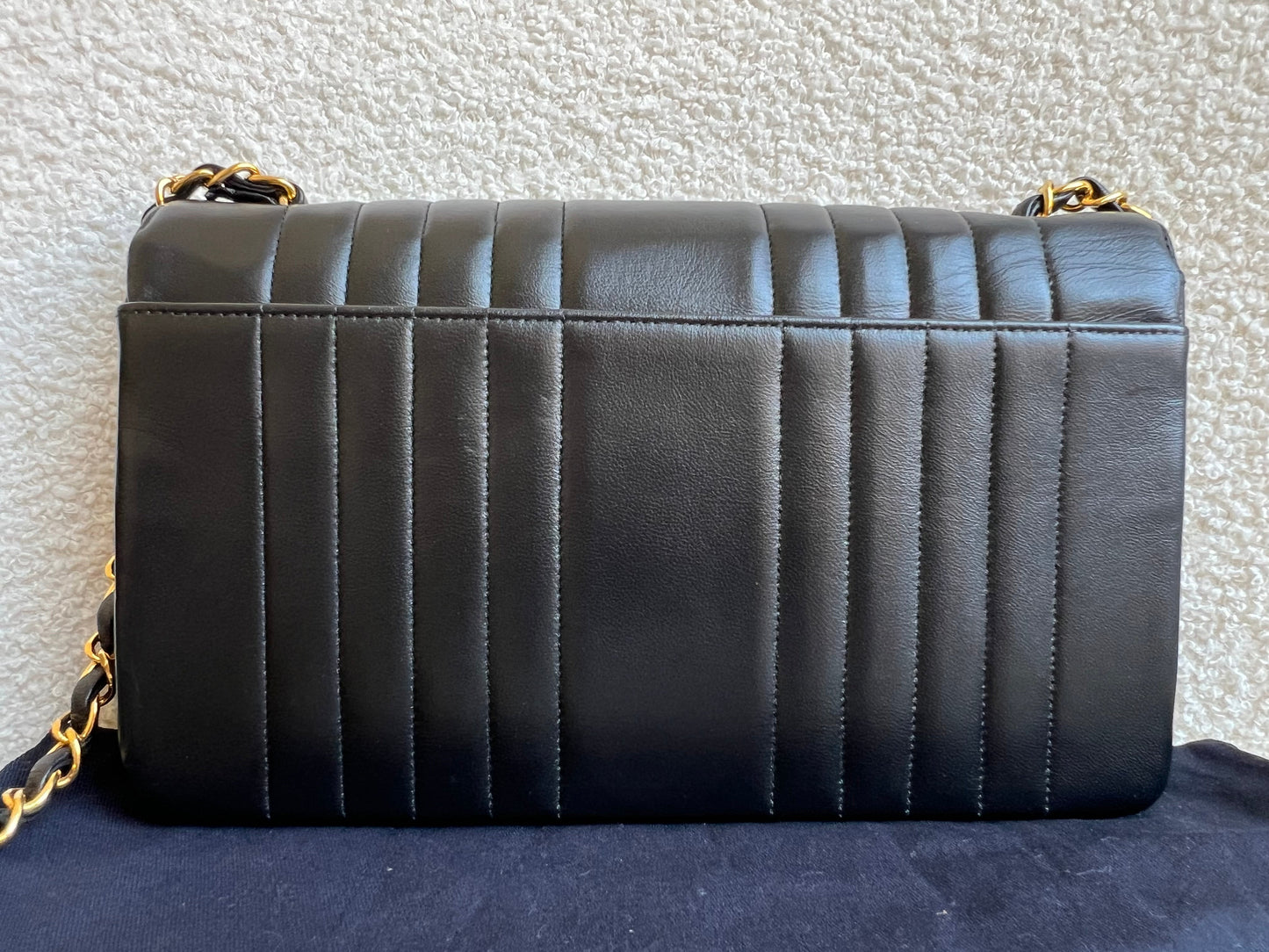 Chanel Medium Black Vertical Quilted Lambskin Vintage Classic Flap Bag with 24K gold hardware