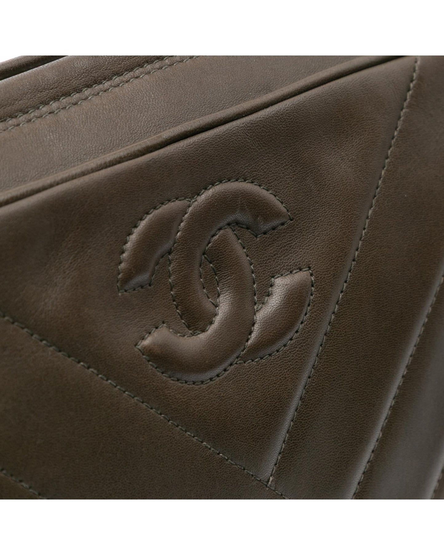 Chevron Lambskin Tassel Crossbody Bag with Quilted Leather and Zip Closure