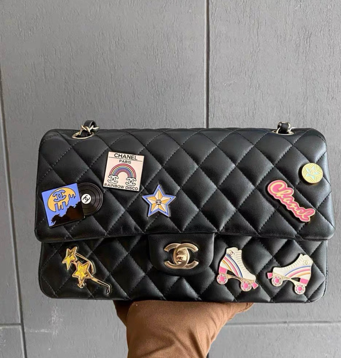 Chanel 24C Flap Bag In Black Leather Embellished With Charms