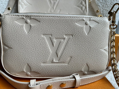 Louis Vuitton Multi Pochette Accessoires Creme Empreinte (RRP £2140)
