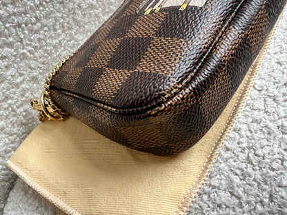 Louis Vuitton Limited Edition Trunks and Locks Mini Pochette Accessoires in Damier Ebene