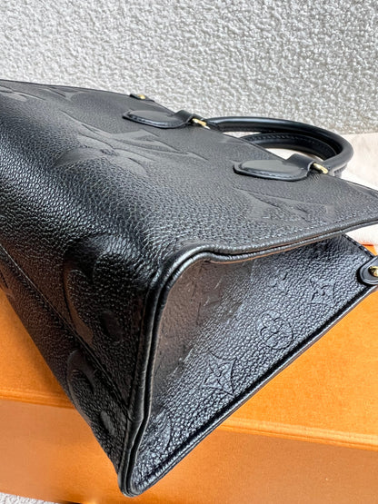 Louis Vuitton On the Go Black PM Empreinte (RRP £2,420)
