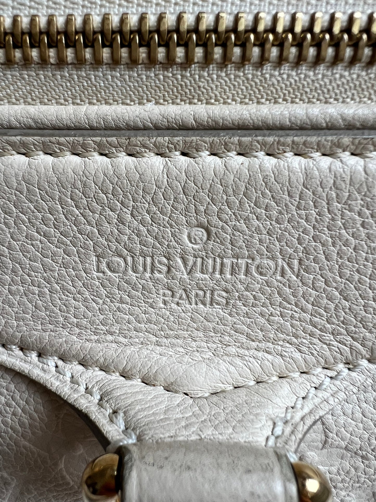 Louis Vuitton Inspiree in Cream Empreinte Leather with gold hardware