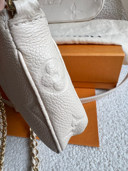 Louis Vuitton Multi Pochette Accessoires Creme Empreinte (RRP £2140)