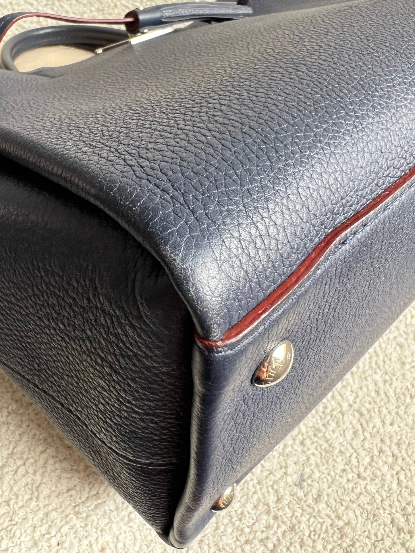 Louis Vuitton Lockmeto Bag in Marine Rouge