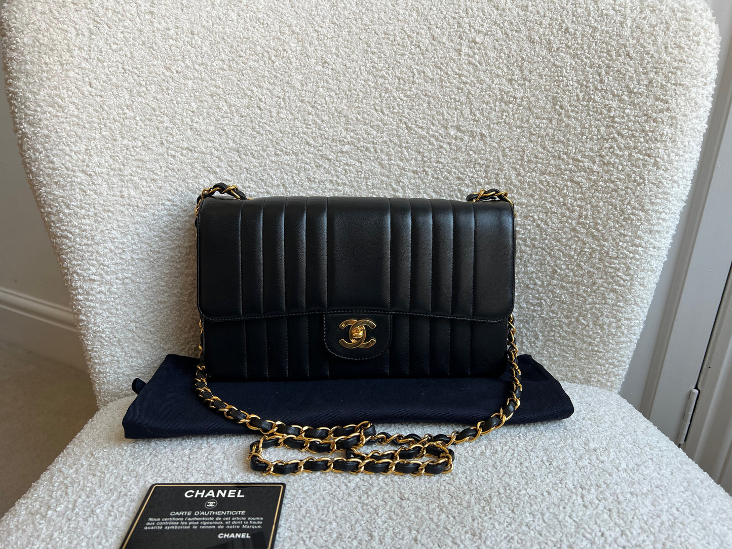 Chanel Medium Black Vertical Quilted Lambskin Vintage Classic Flap Bag with 24K gold hardware