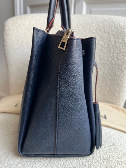 Louis Vuitton Lockmeto Bag in Marine Rouge
