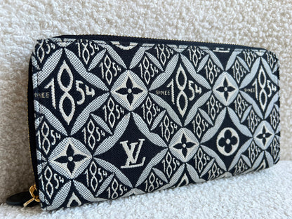 Louis Vuitton Zippy Wallet in Monogram Jacquard