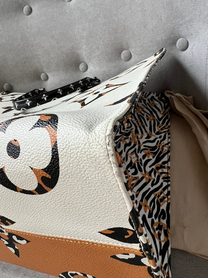 Louis Vuitton Limited Edition On the Go GM Jungle Giant Monogram Ivory Havana Beige (RRP £2,450)