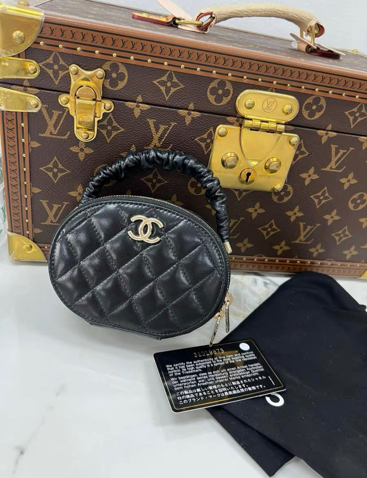 Chanel Cc Ruched Oval Top Handle Quilted Lambskin Mini