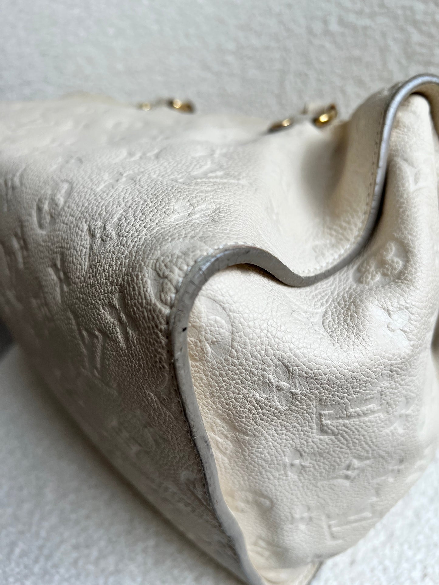 Louis Vuitton Inspiree in Cream Empreinte Leather with gold hardware