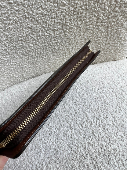 Louis Vuitton Porte Monnaie Zip Around Long Wallet in Monogram