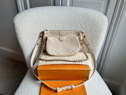 Louis Vuitton Multi Pochette Accessoires Creme Empreinte (RRP £2140)