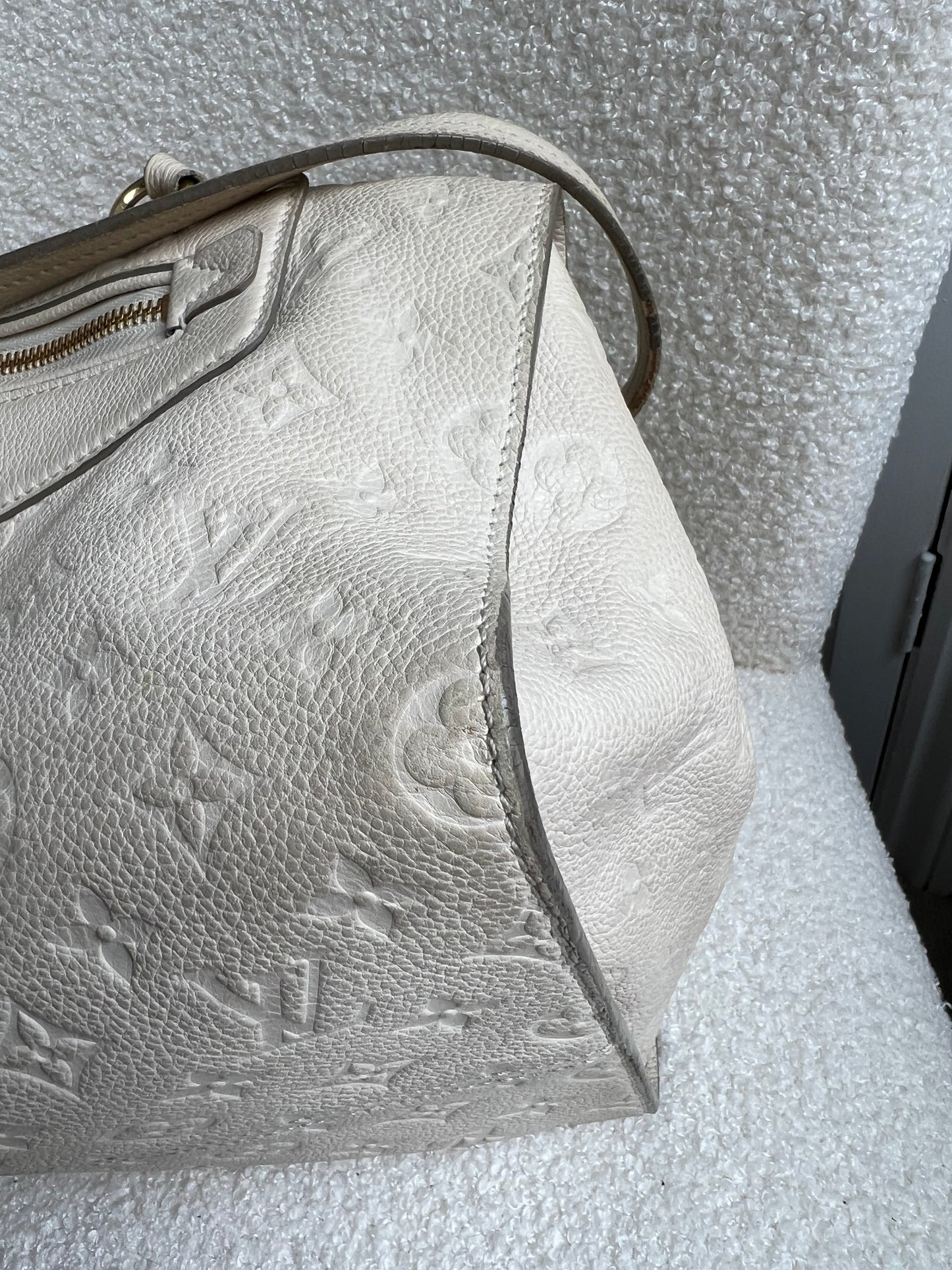Louis Vuitton Inspiree in Cream Empreinte Leather with gold hardware