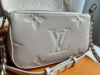 Louis Vuitton Multi Pochette Accessoires Creme Empreinte (RRP £2140)