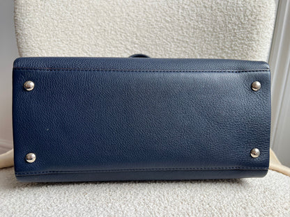 Louis Vuitton Lockmeto Bag in Marine Rouge