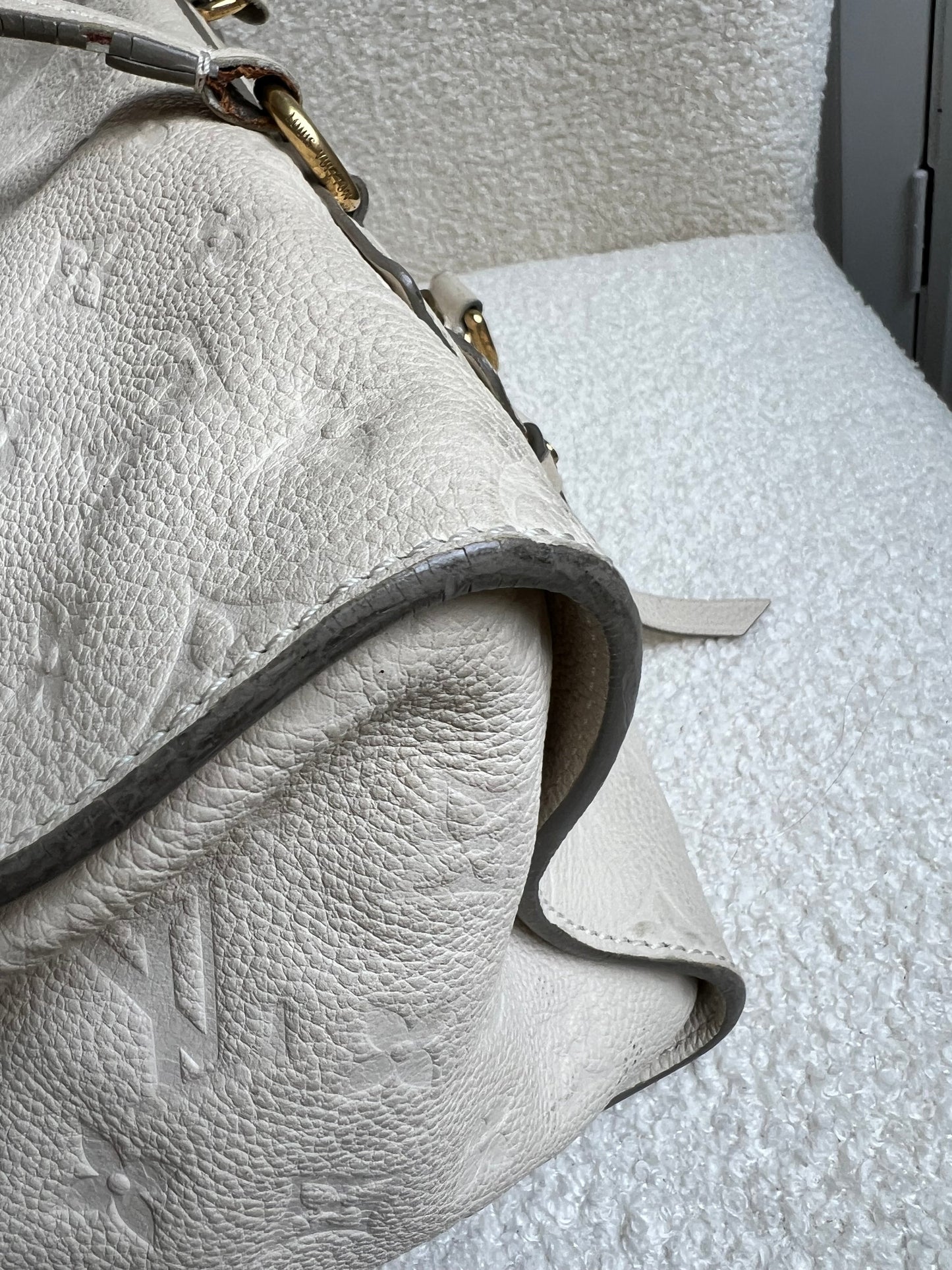 Louis Vuitton Inspiree in Cream Empreinte Leather with gold hardware