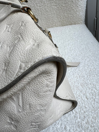 Louis Vuitton Inspiree in Cream Empreinte Leather with gold hardware