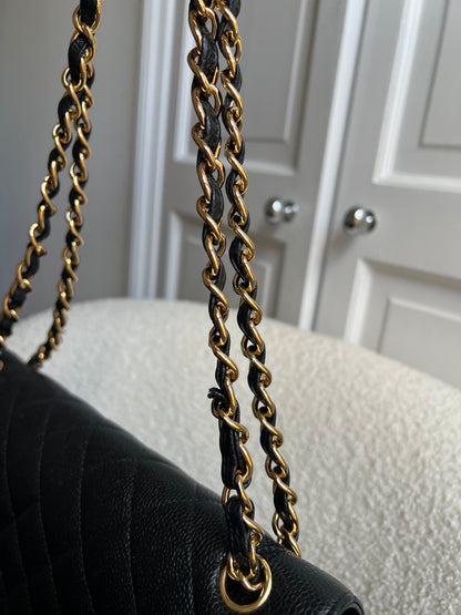 Chanel Jumbo Double Flap in Black Caviar with gold hardware (RRP £9830)