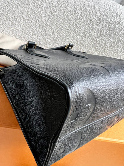 Louis Vuitton On the Go Black PM Empreinte (RRP £2,420)