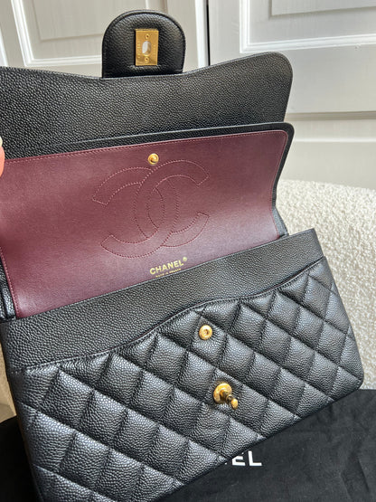 Chanel Jumbo Double Flap in Black Caviar with gold hardware (RRP £9830)