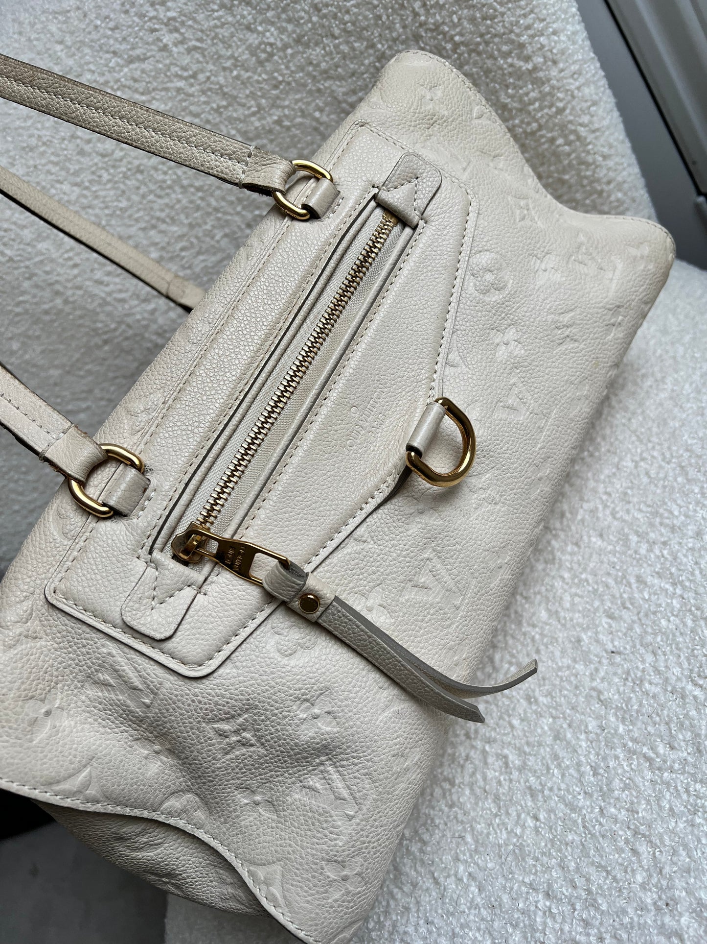 Louis Vuitton Inspiree in Cream Empreinte Leather with gold hardware