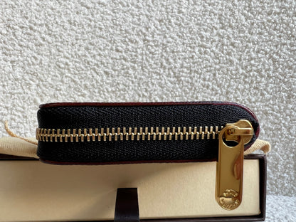 Louis Vuitton Zippy Coin Purse in Black Multicolore Monogram