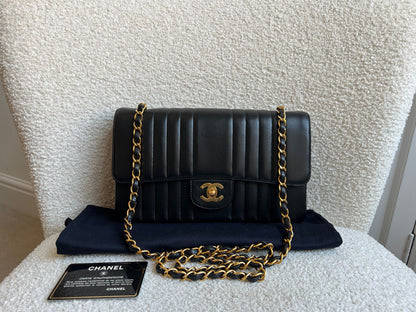 Chanel Medium Black Vertical Quilted Lambskin Vintage Classic Flap Bag with 24K gold hardware