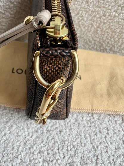 Louis Vuitton Limited Edition Trunks and Locks Mini Pochette Accessoires in Damier Ebene