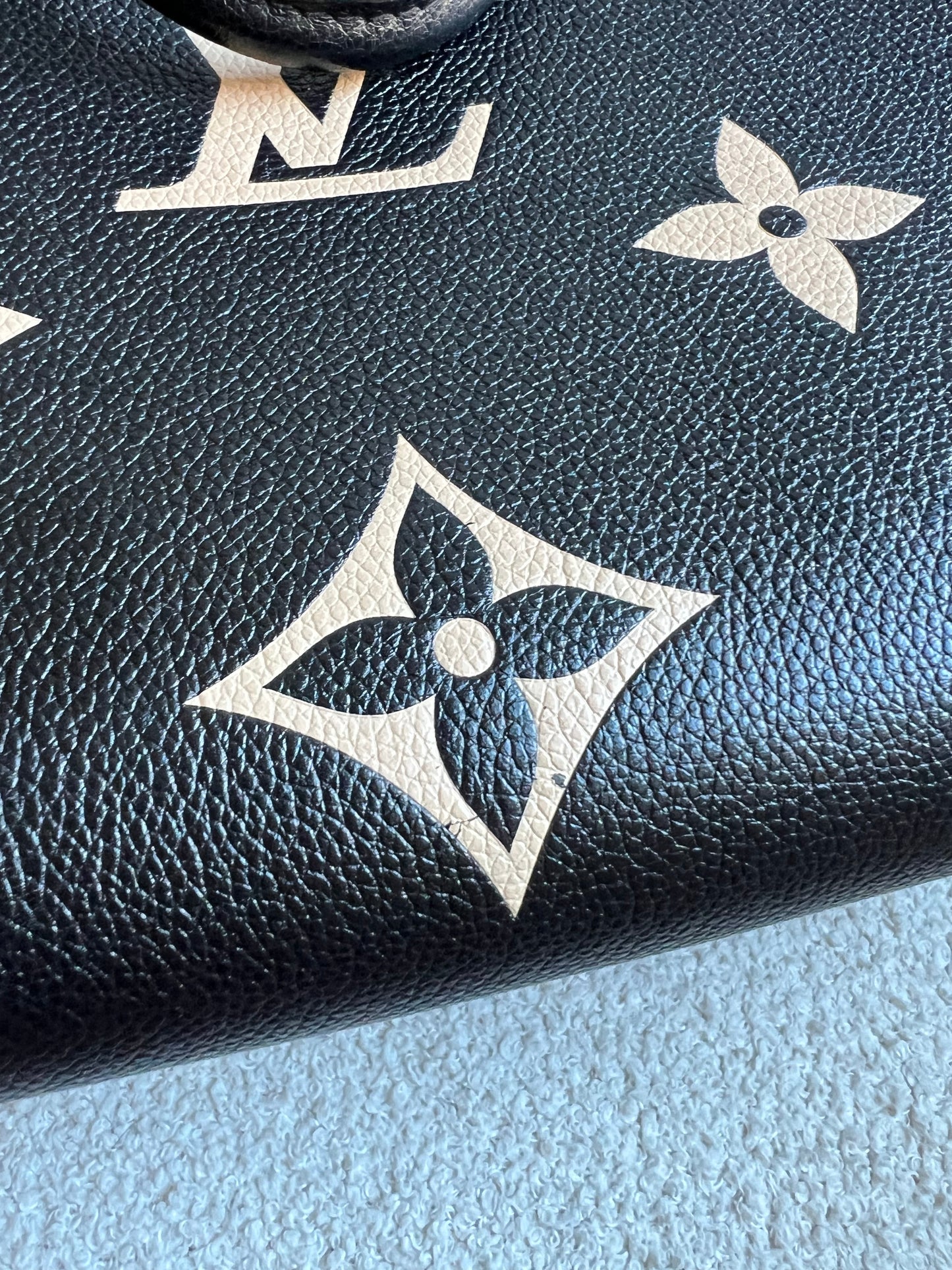 Louis Vuitton On the Go MM Bicolour Empreinte (RRP £2,660)