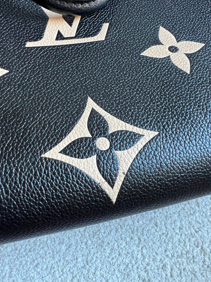 Louis Vuitton On the Go MM Bicolour Empreinte (RRP £2,660)