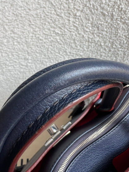Louis Vuitton Lockmeto Bag in Marine Rouge