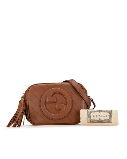 Small Leather Crossbody Bag with Tassel Detail