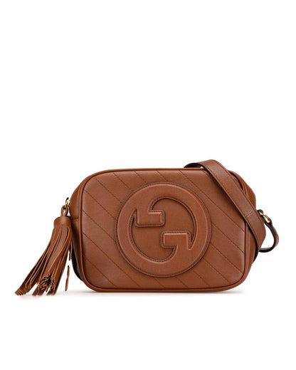 Small Leather Crossbody Bag with Tassel Detail