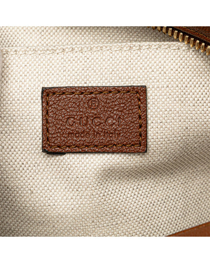 Small Leather Crossbody Bag with Tassel Detail