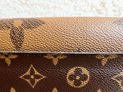 Louis Vuitton Sarah Wallet in reverse Monogram and Brown (RRP £550)