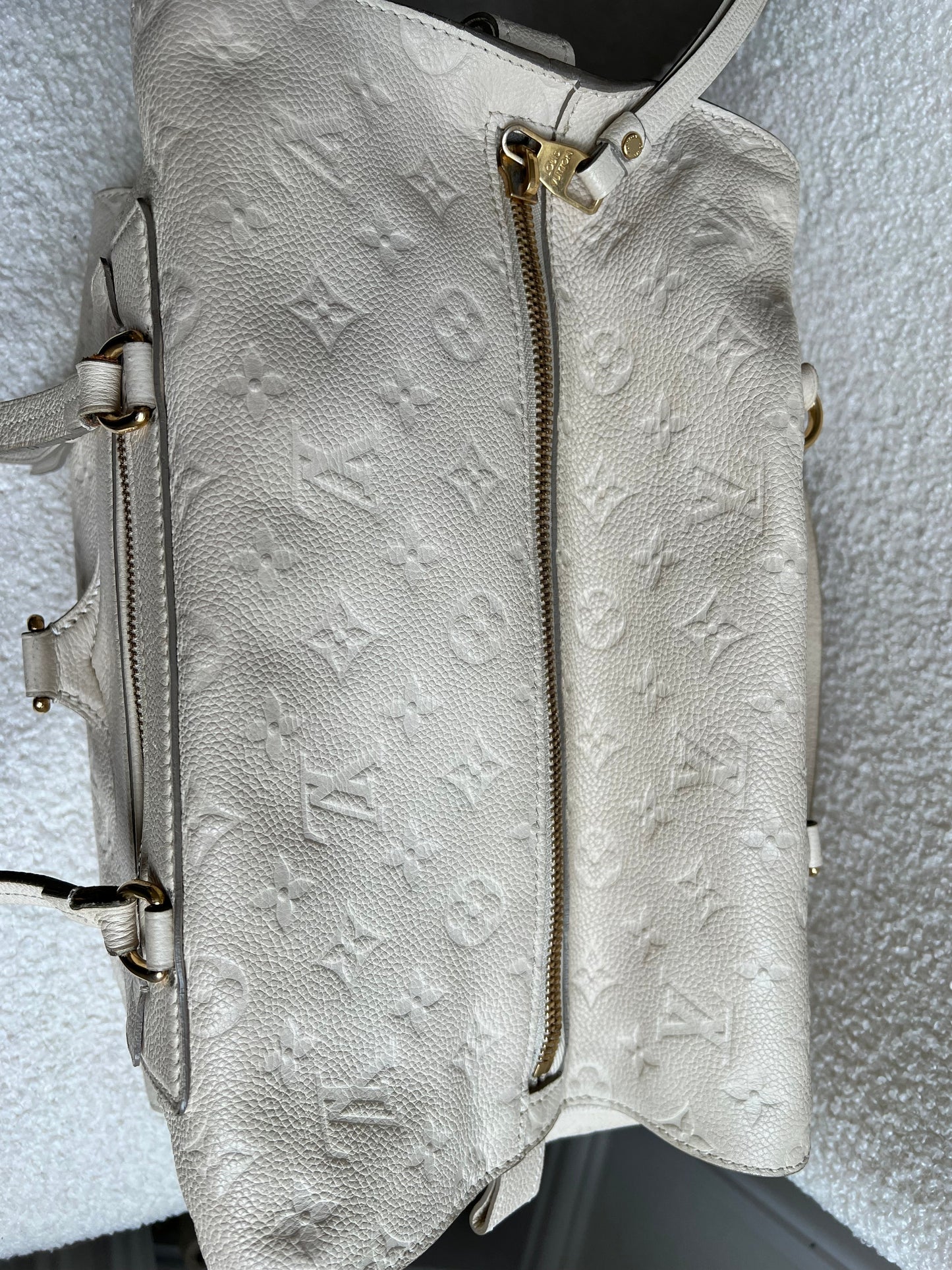 Louis Vuitton Inspiree in Cream Empreinte Leather with gold hardware