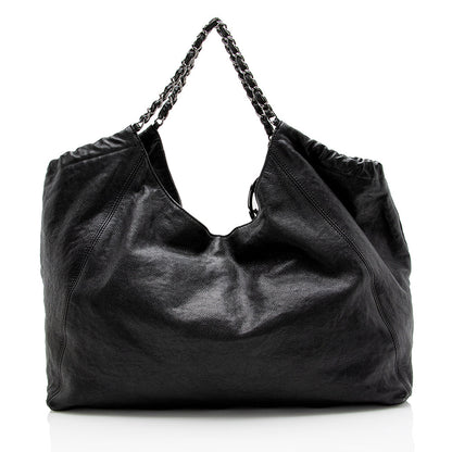 Chanel Quilted Leather CC Charm Hobo (SHF-15325) Shoulder Bag