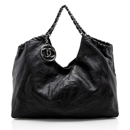 Chanel Quilted Leather CC Charm Hobo (SHF-15325) Shoulder Bag